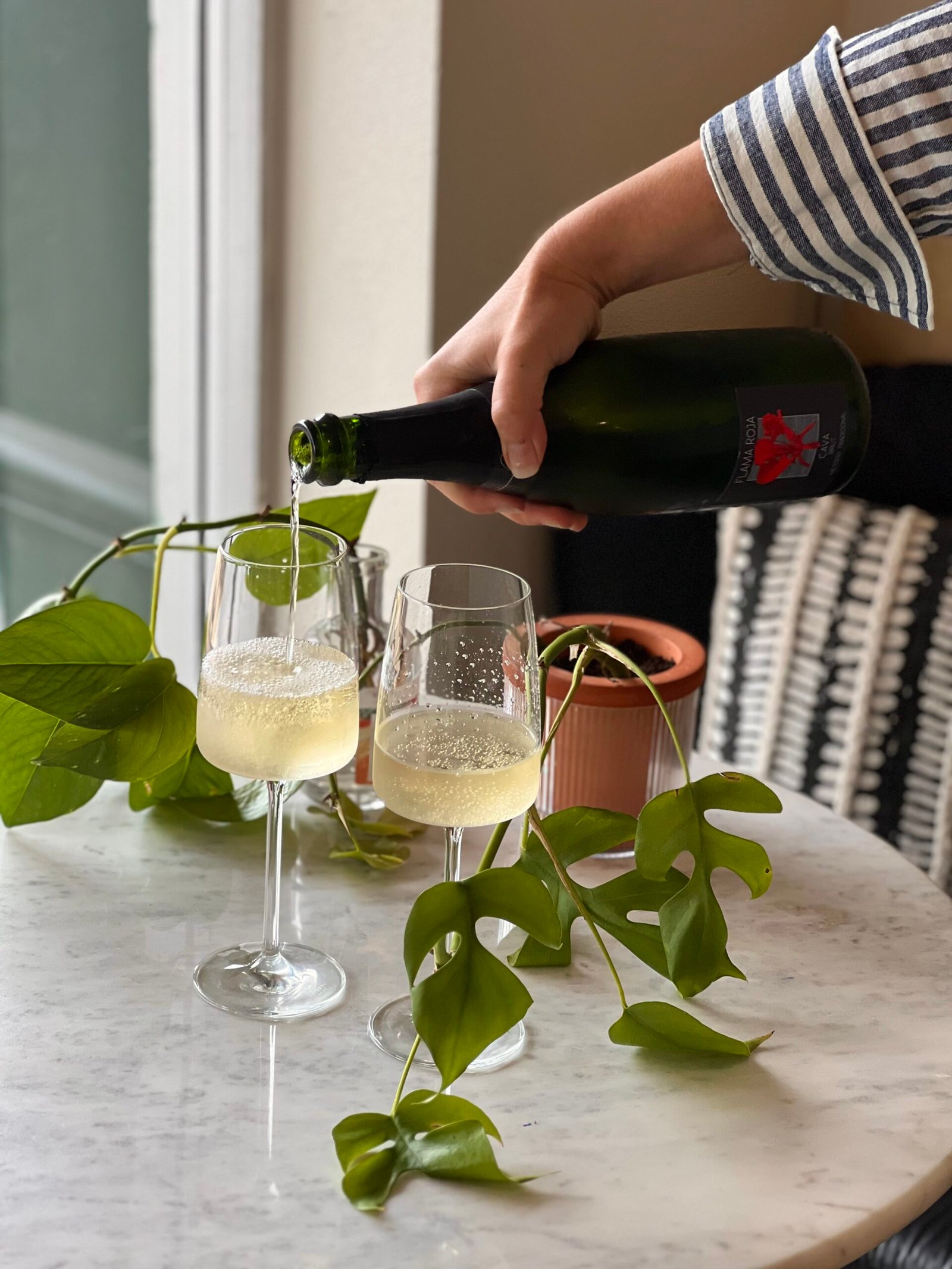 Pouring natural sparkling wine